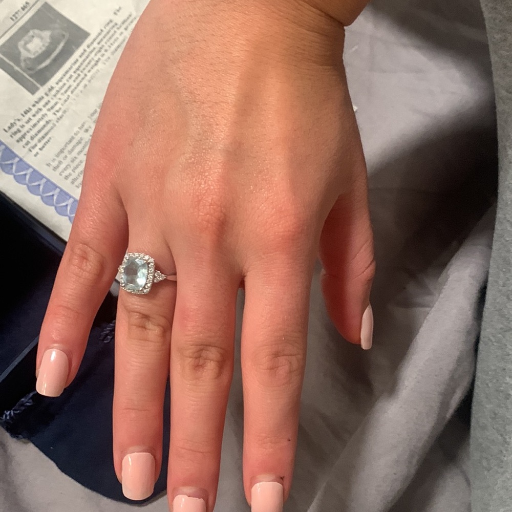 Lady’s, 14kt white gold, aquamarine and diamond ring. Size 7.